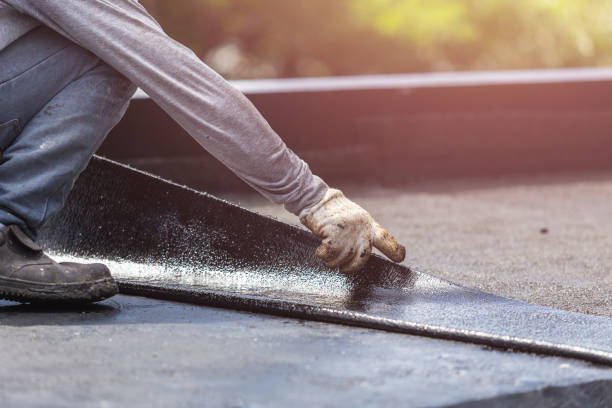 Professional Emergency Waterproofing technician working in Williamsburg, PA